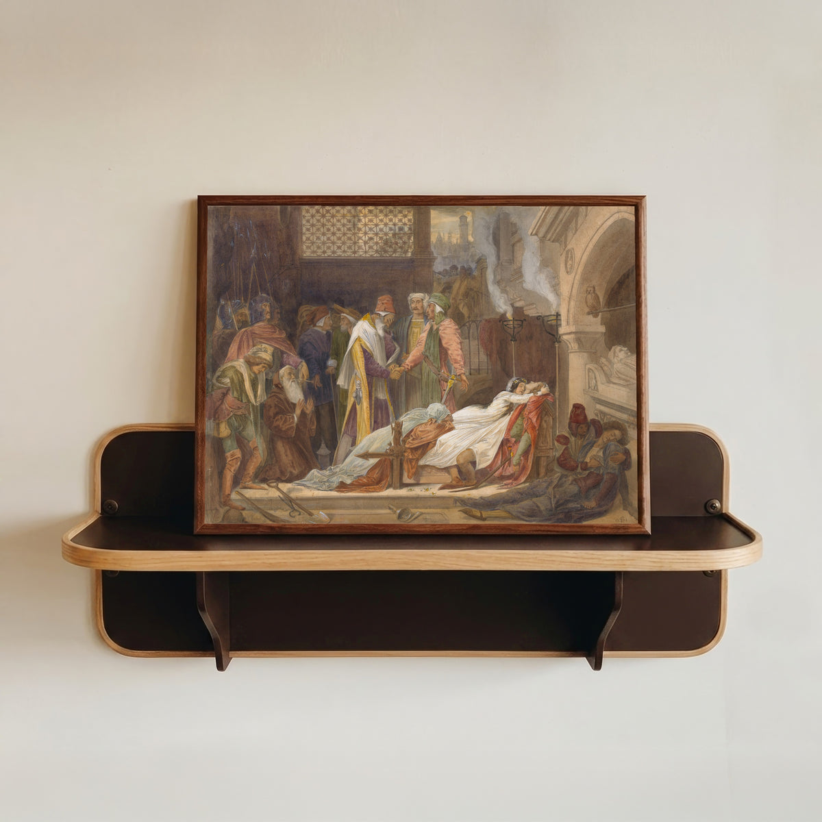 Framed art print of The Reconciliation of the Montagues and the Capulets by Frederic Leighton, in a dark wood frame resting on a wall shelf