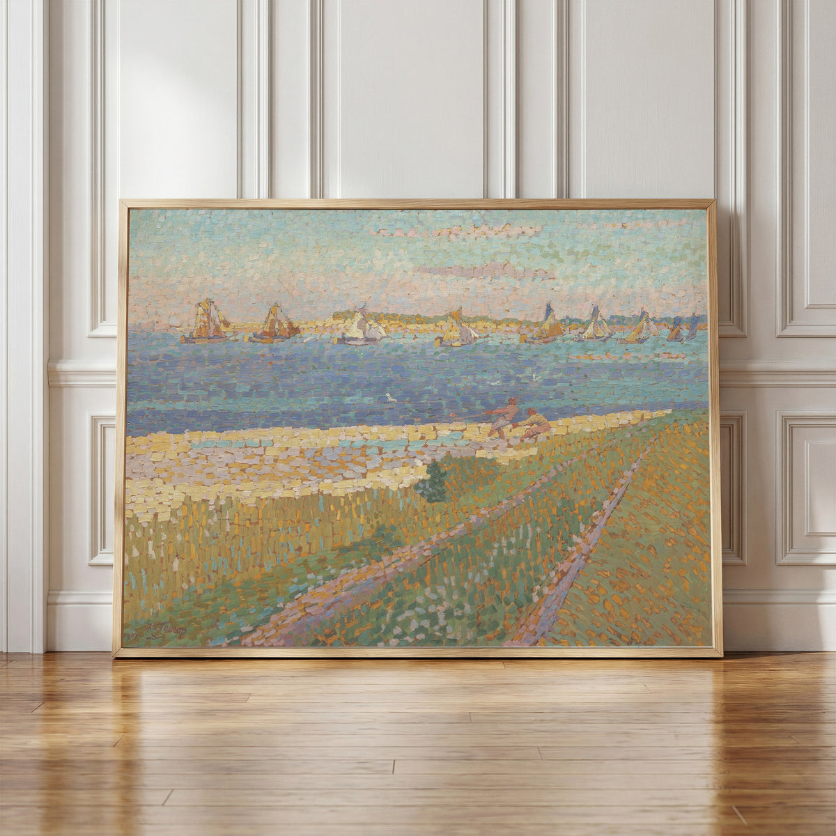 Framed art print of The Schelde near Veere by Jan Toorop, in a light wood frame leaning against a panelled white wall