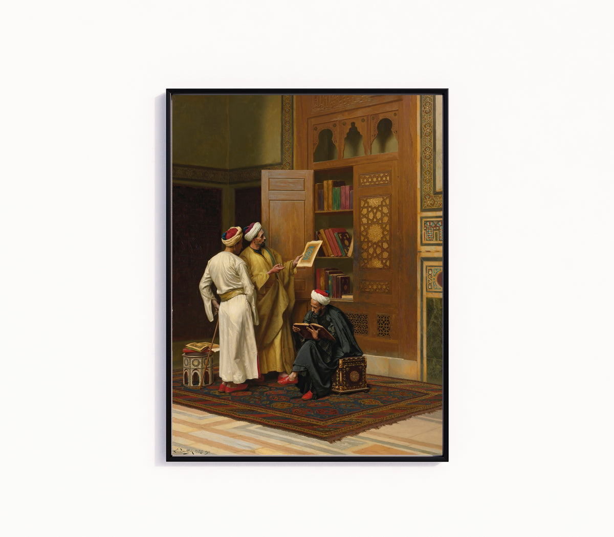 Framed art print of The Scholars by Ludwig Deutsch, in a slim black frame on a plain white wall