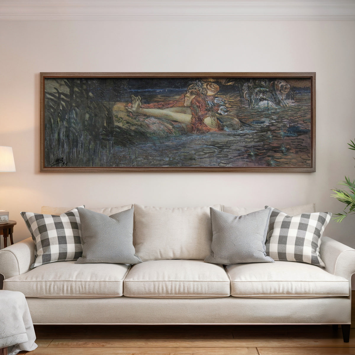 Framed art print of The Sea Tsar's Farewell to Volkhova by Mikhail Vrubel, above a cream sofa