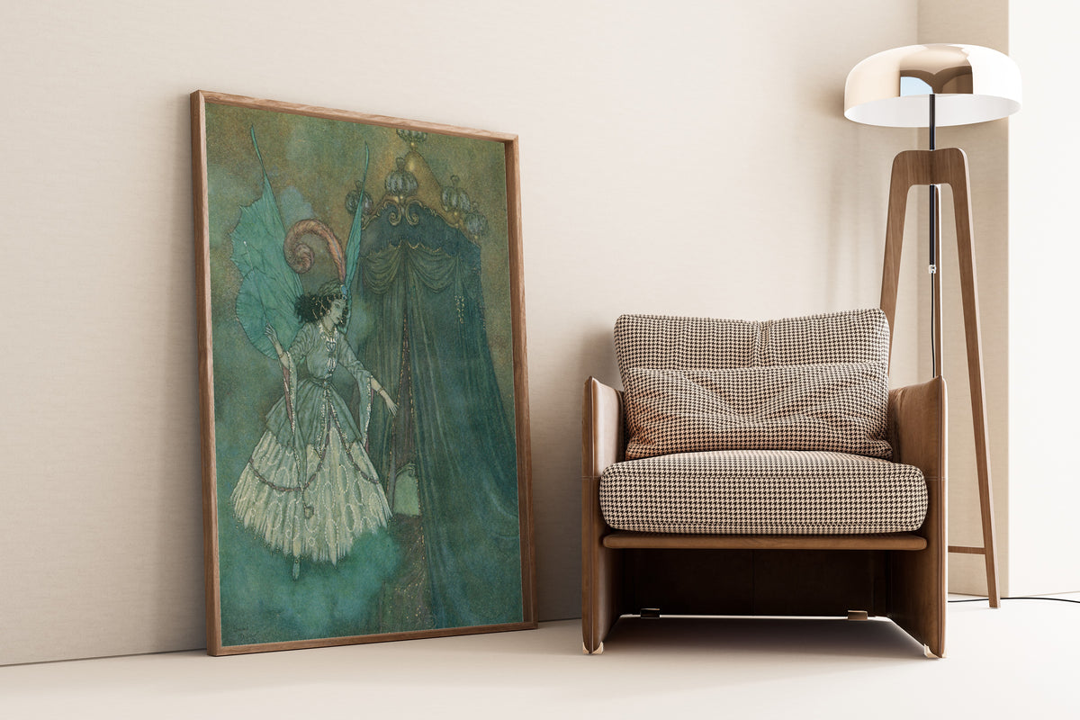 Framed art print of The Sleeping Beauty and Other Fairy Tales: A Stately and… by Edmund Dulac, leaning against a wall beside an armchair and a floor lamp