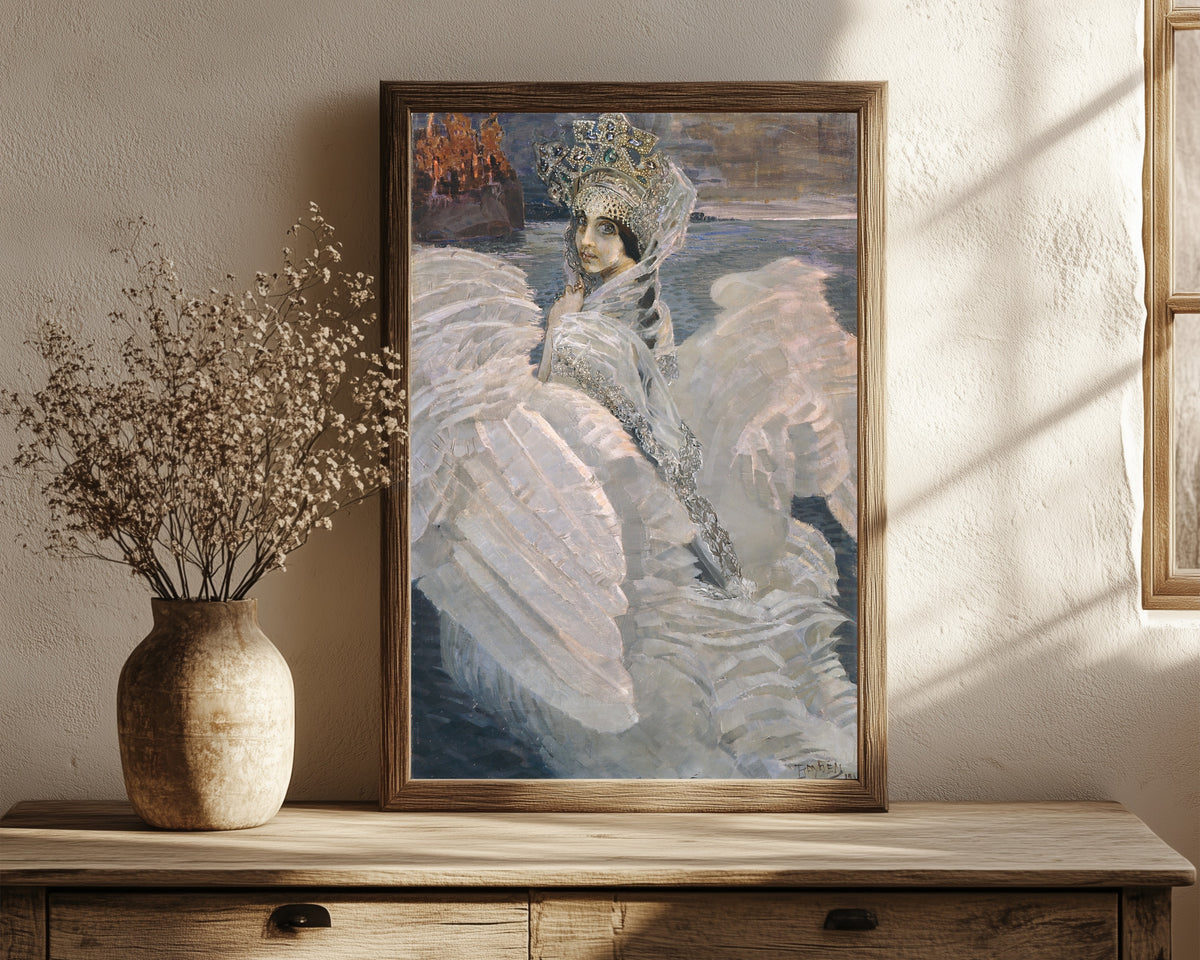 Framed art print of The Swan Princess by Mikhail Vrubel, in a dark wood frame leaning on a rustic console beside dried flowers