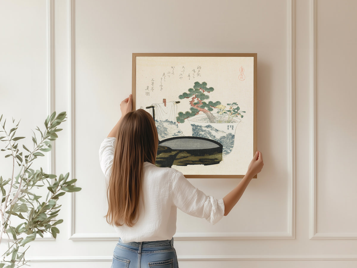 Framed art print of The Talisman by Katsushika Hokusai, hung on a panelled wall