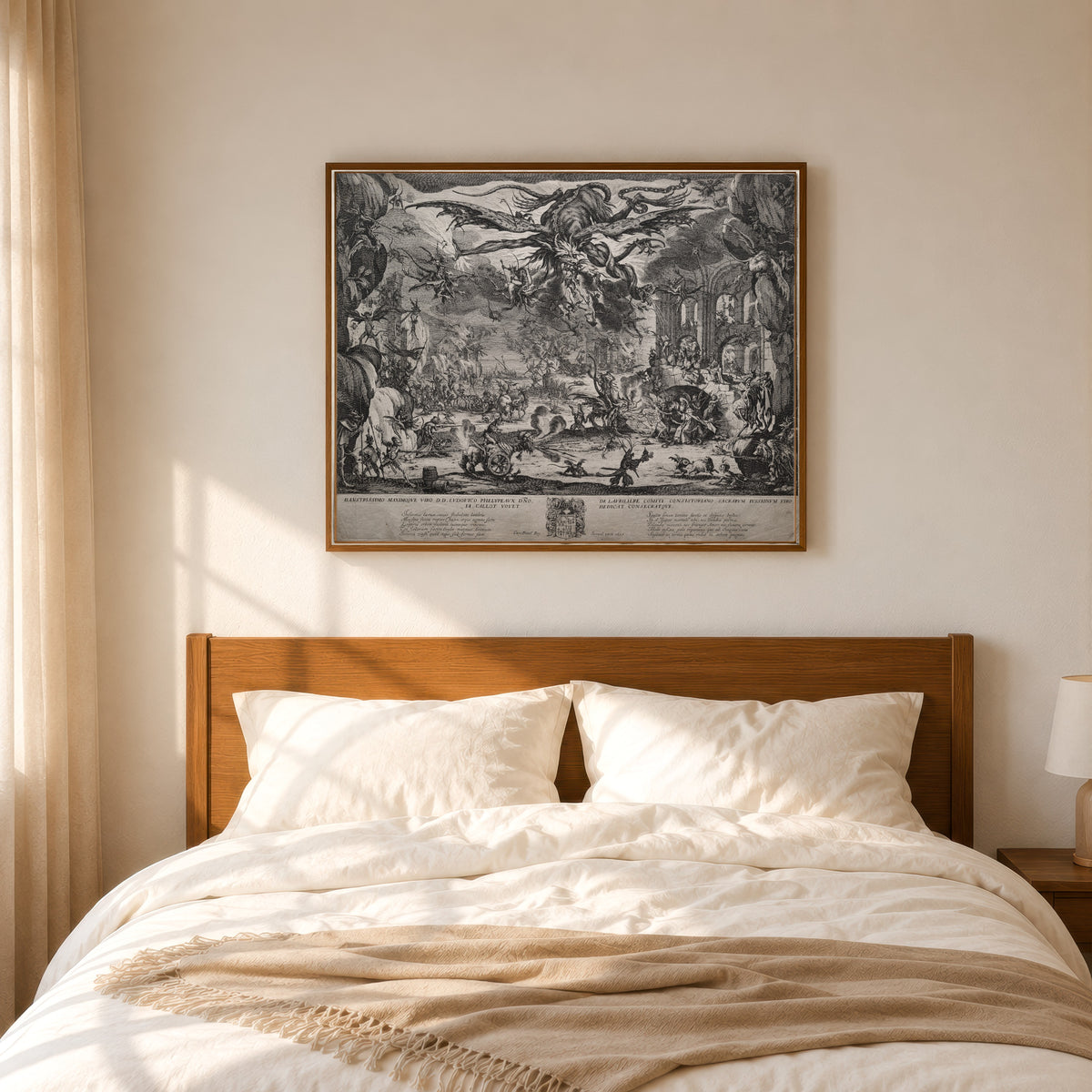 Framed art print of The Temptation of Saint Anthony (second version) by Jacques Callot, in a slim wood frame above a bed in a sunlit bedroom