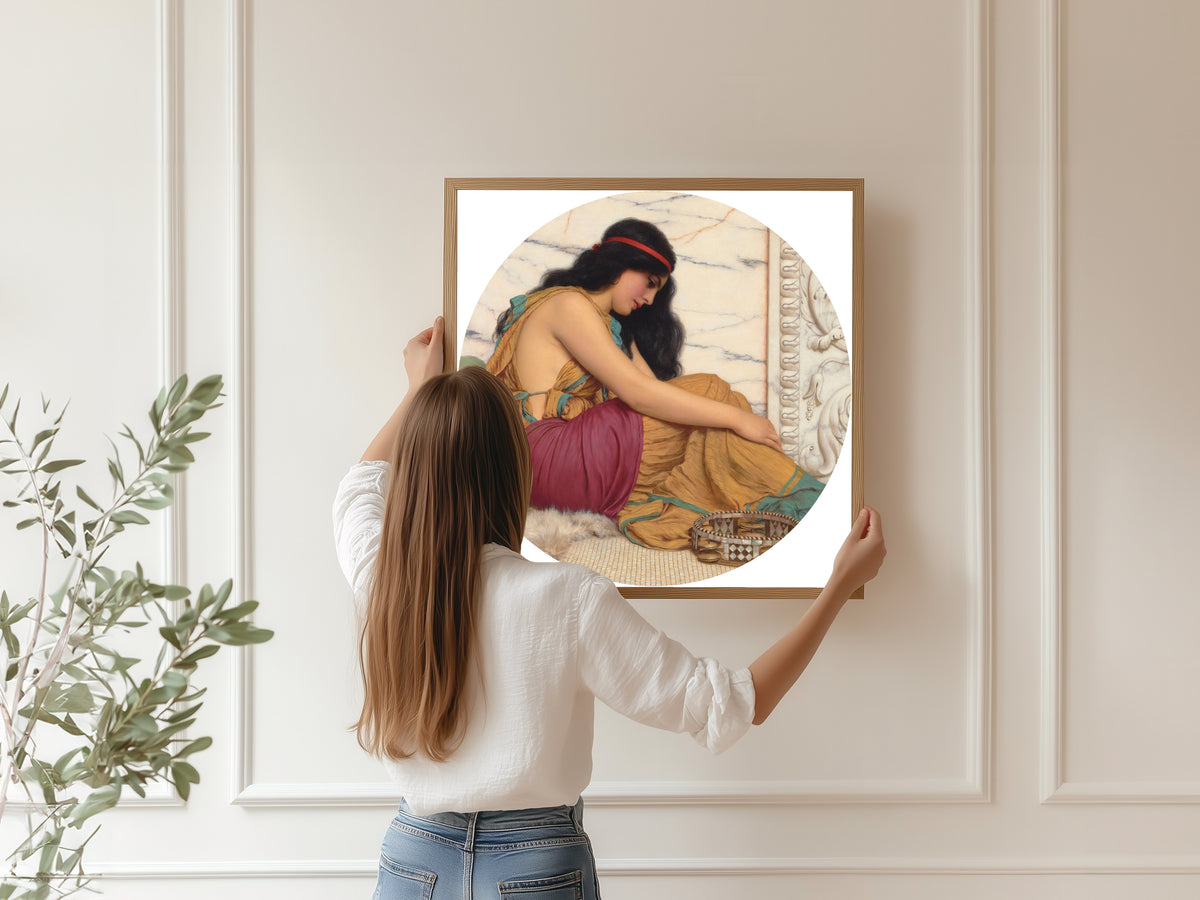 Framed art print of The Tired Danseuse by John William Godward, hung on a panelled wall