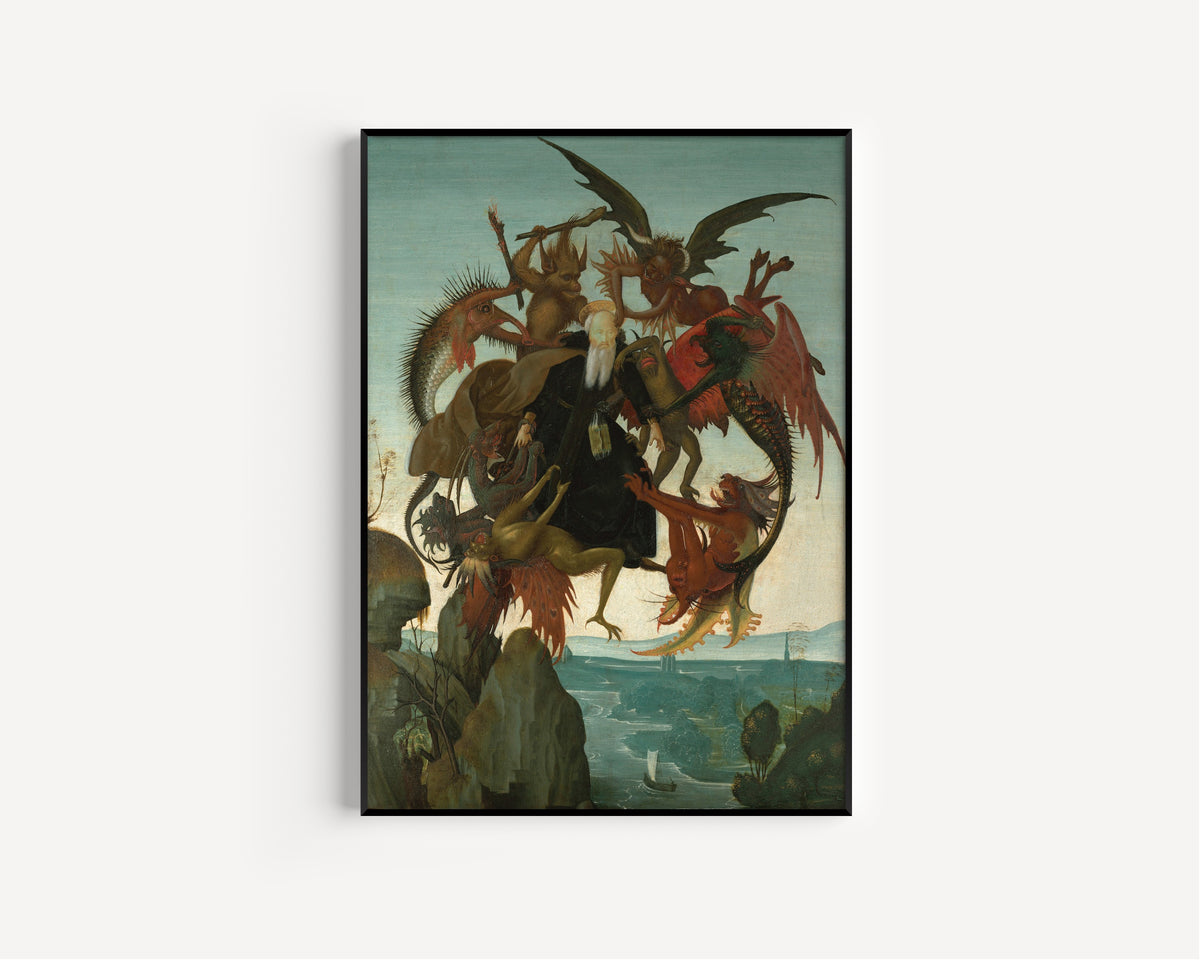 Framed art print of The Torment of Saint Anthony by Michelangelo, in a slim black frame on a plain white wall