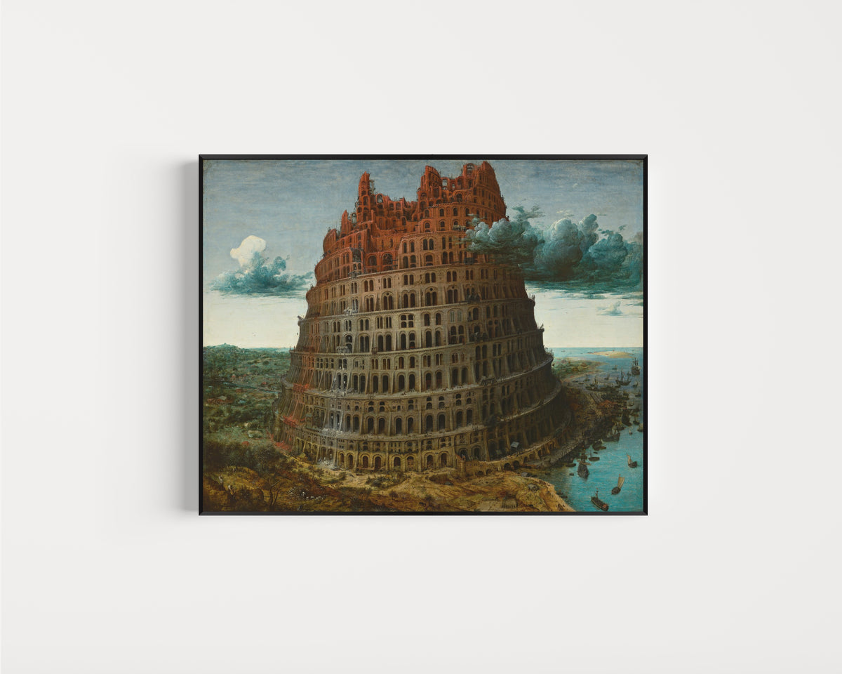 Framed art print of The Tower of Babel (Rotterdam) by Pieter Bruegel the Elder, in a slim black frame on a plain white wall
