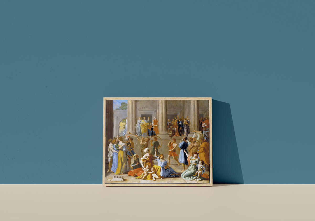 Framed art print of The Triumph of David by Nicolas Poussin, in a light wood frame leaning on a blue wall