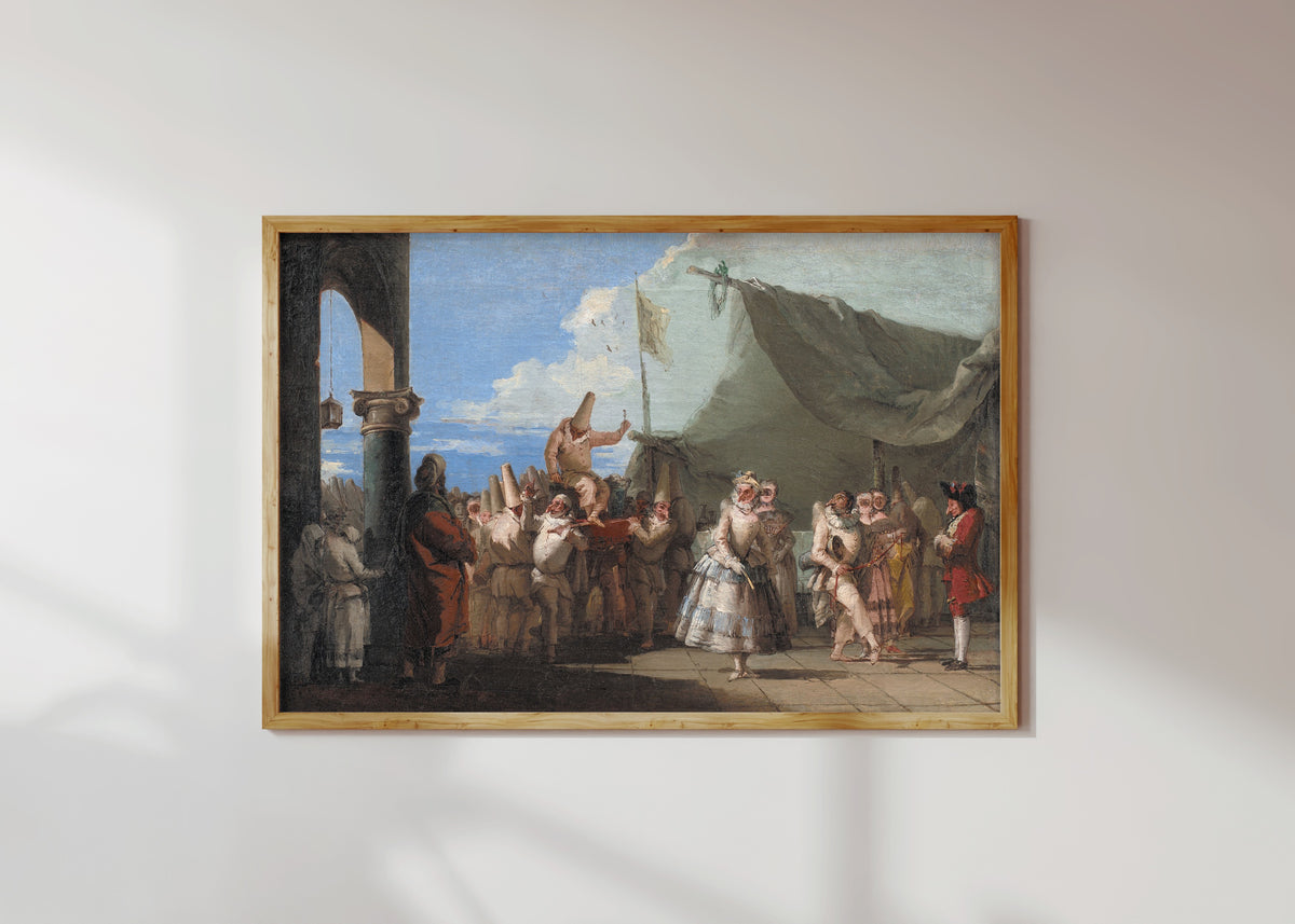 Framed art print of The Triumph of Pulcinella by Giovanni Domenico Tiepolo, in a light wood frame on a sunlit white wall
