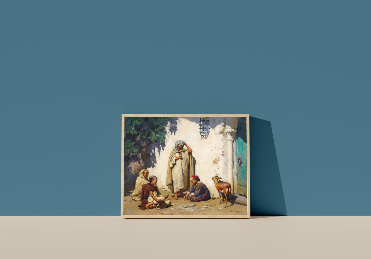 Framed art print of The Young Scribe by Frederick Arthur Bridgman, in a light wood frame leaning on a blue wall