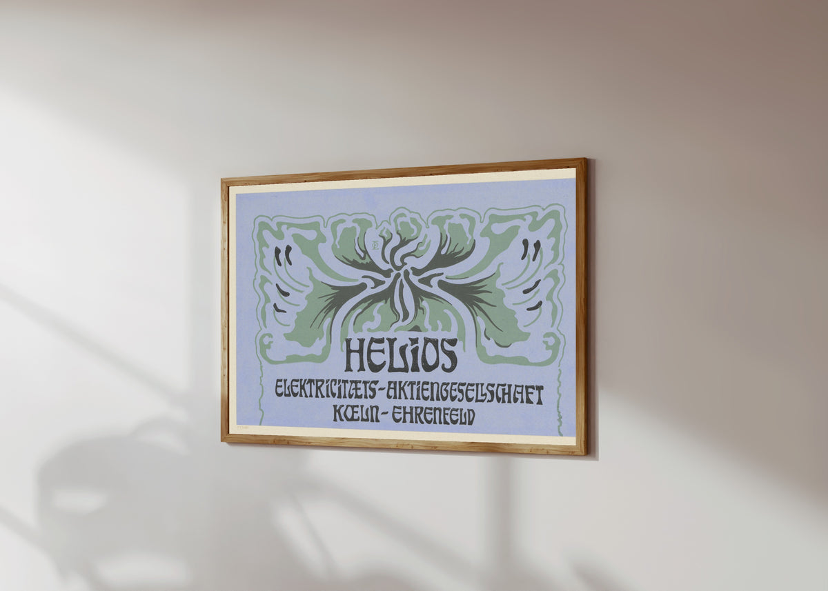 Framed art print of Titelblatt Helios Elektrizitäts-Aktiengesellschaft… by Otto Eckmann, in a light wood frame on a sunlit white wall, seen at a slight angle
