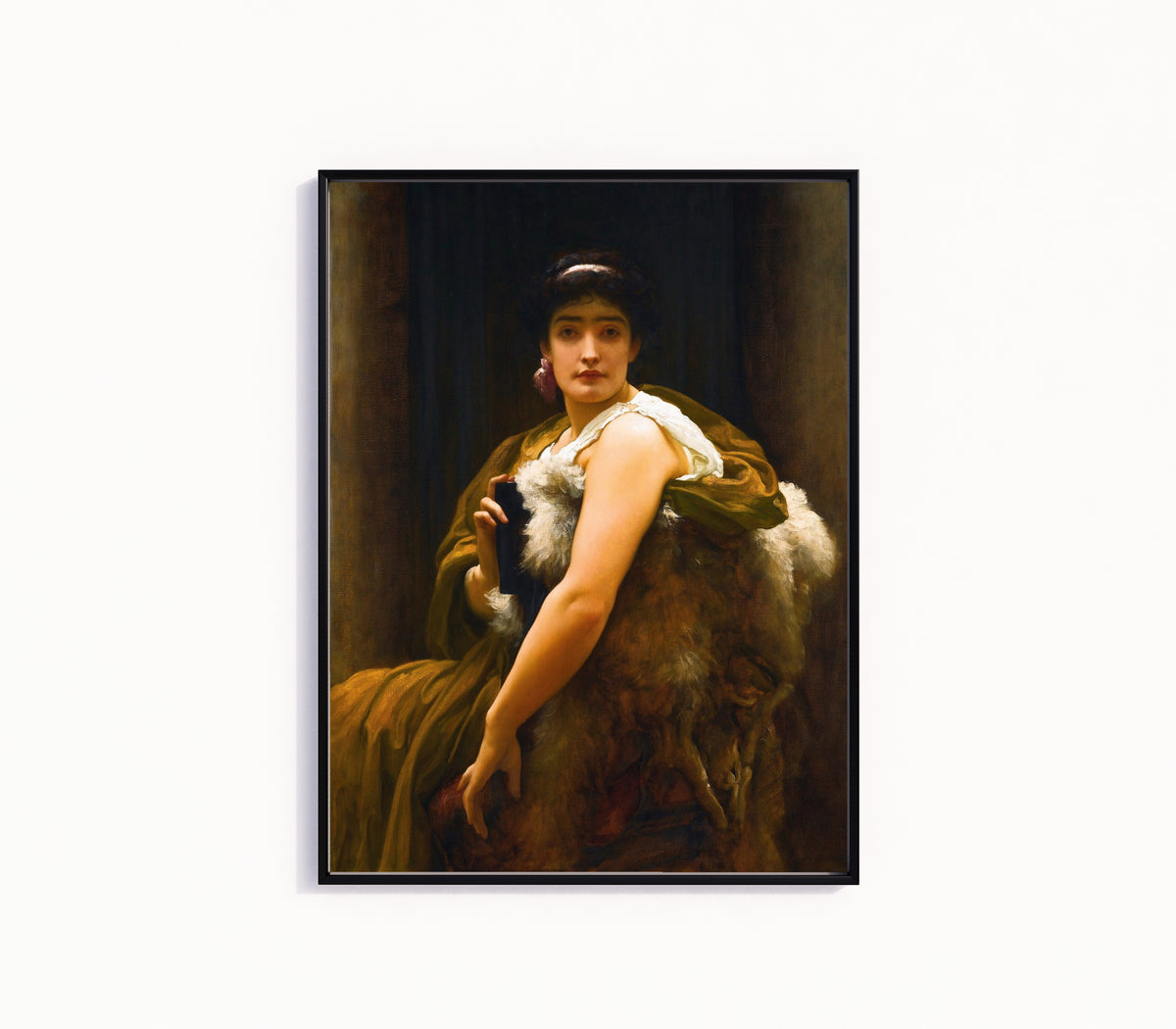 Framed art print of 'Twixt Hope and Fear by Frederic Leighton, in a slim black frame on a plain white wall