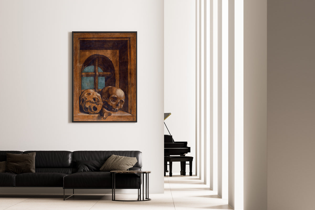 Framed art print of Two Skulls in a Window Niche by Hans Holbein the Younger, on the wall of a minimal living room