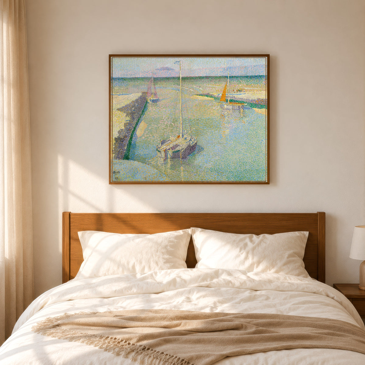 Framed art print of Uitmonding van den Rijn ou Le Port de Katwijk by Jan Toorop, in a slim wood frame above a bed in a sunlit bedroom