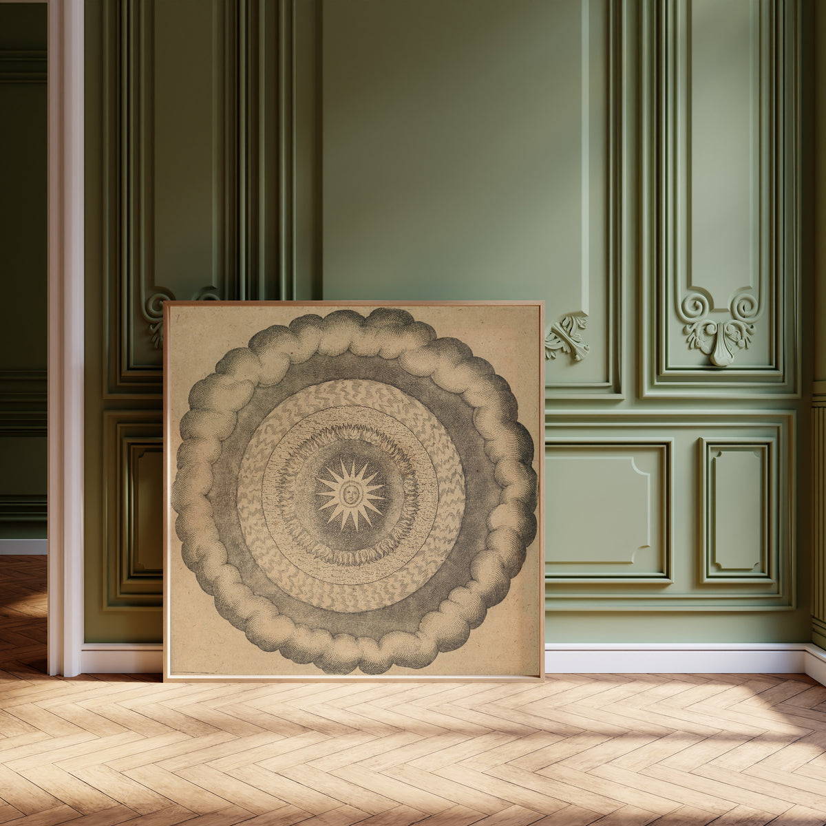 Framed art print of Utriusque Cosmi, the Primordial Plate on Page 43 by Robert Fludd, leaning against olive-green panelling on a herringbone floor