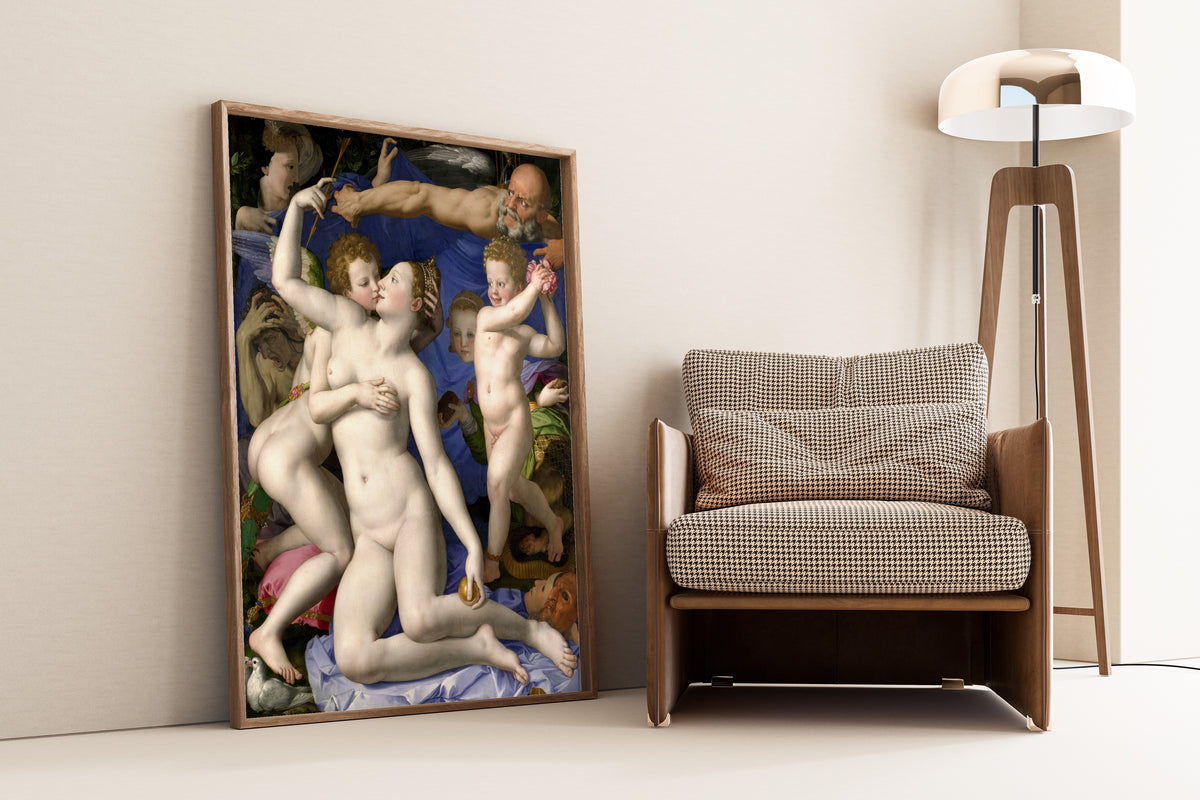 Framed art print of Venus, Cupid, Folly and Time by Bronzino, leaning against a wall beside an armchair and a floor lamp