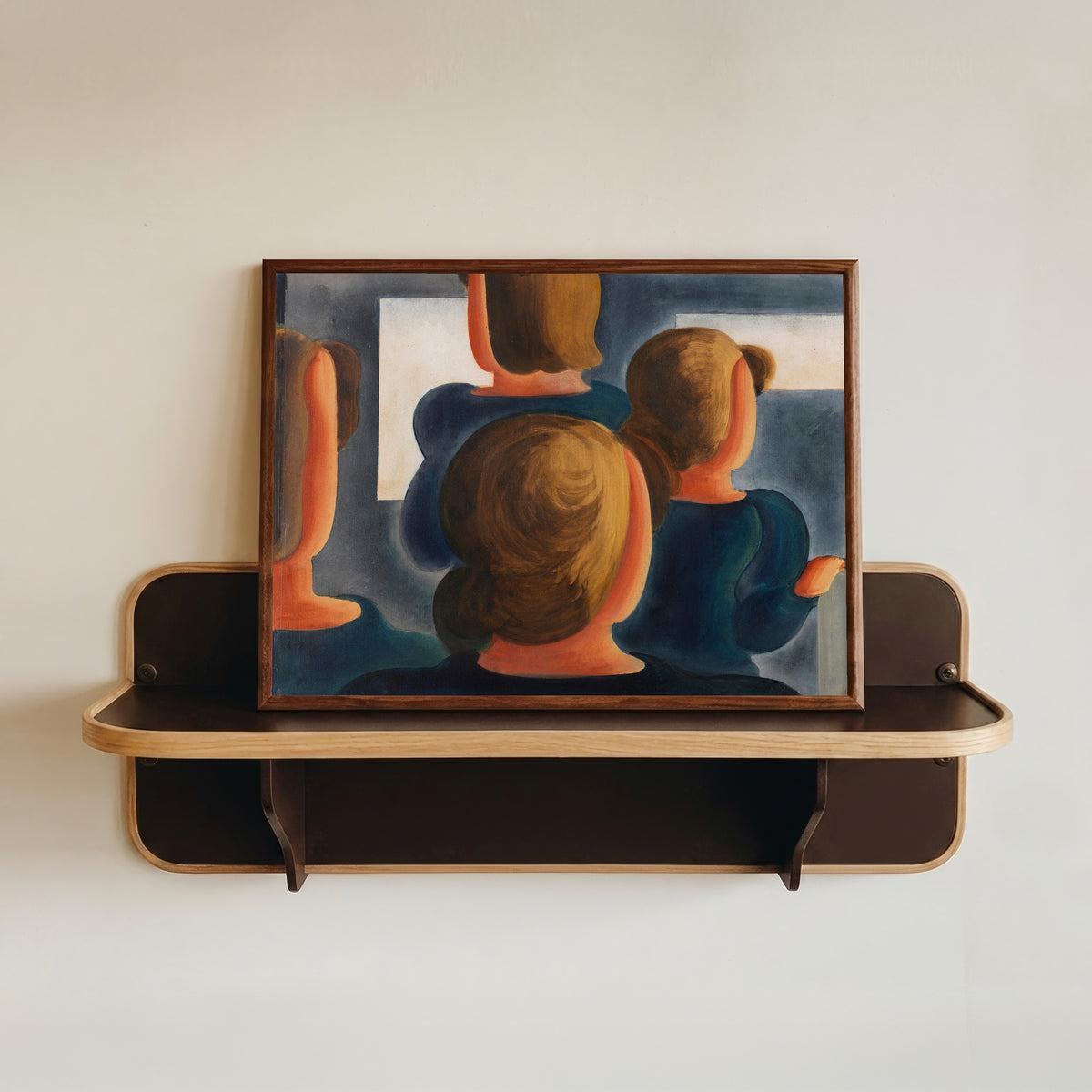 Framed art print of Vierergruppe mit Grau by Oskar Schlemmer, in a dark wood frame resting on a wall shelf