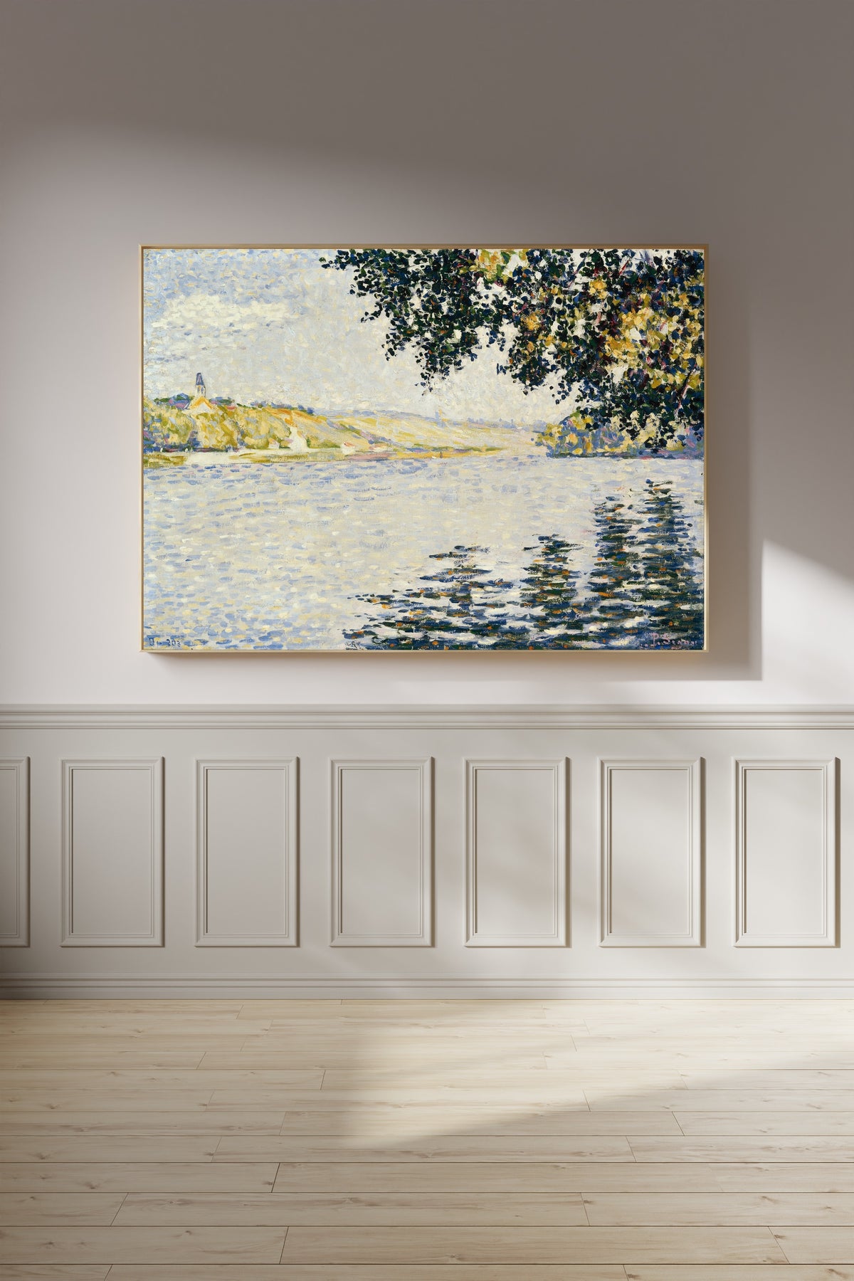 Framed art print of View of the Seine at Herblay by Paul Signac, on a panelled wall in afternoon light