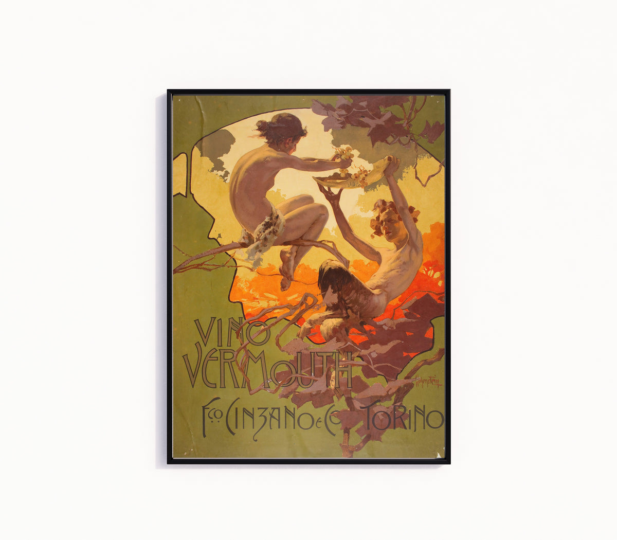 Framed art print of Vino Vermouth Fco. Cinzano e C.º by Adolfo Hohenstein, in a slim black frame on a plain white wall