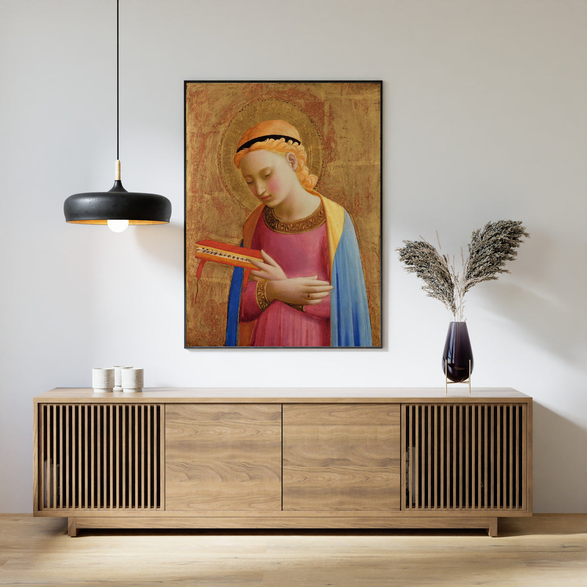 Framed art print of Virgin Annunciate by Fra Angelico, above a slatted wood sideboard