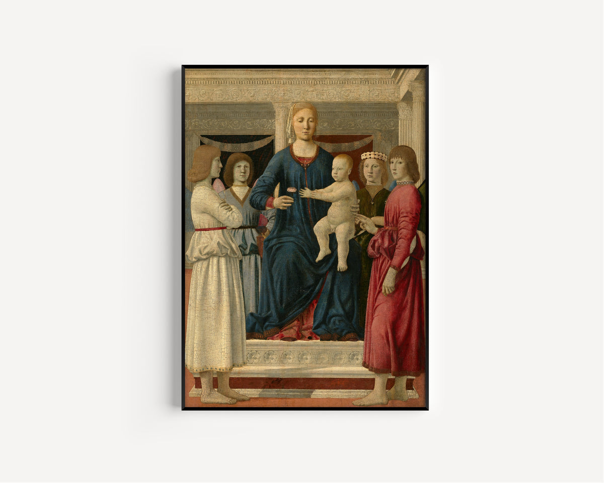 Framed art print of Virgin and child enthroned with four angels by Piero della Francesca, in a slim black frame on a plain white wall