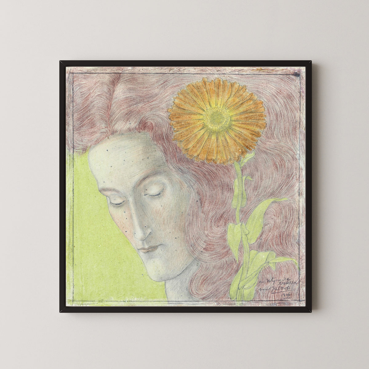 Framed art print of Vrouwenkop met rossig haar en Chrysant by Jan Toorop, in a black frame on a pale wall