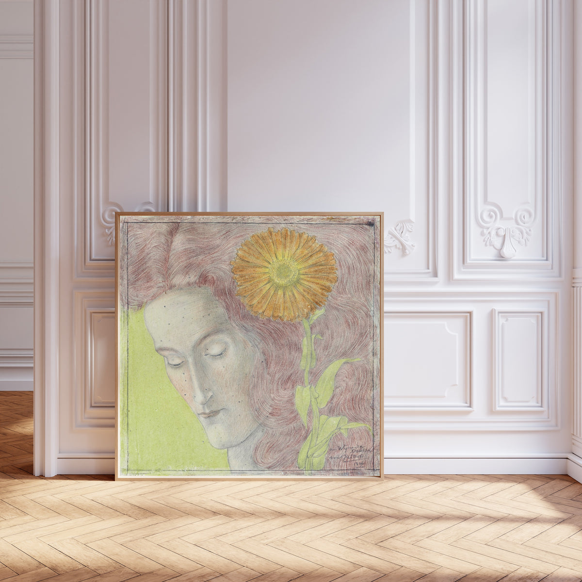 Framed art print of Vrouwenkop met rossig haar en Chrysant by Jan Toorop, leaning against pale pink panelling on a herringbone floor