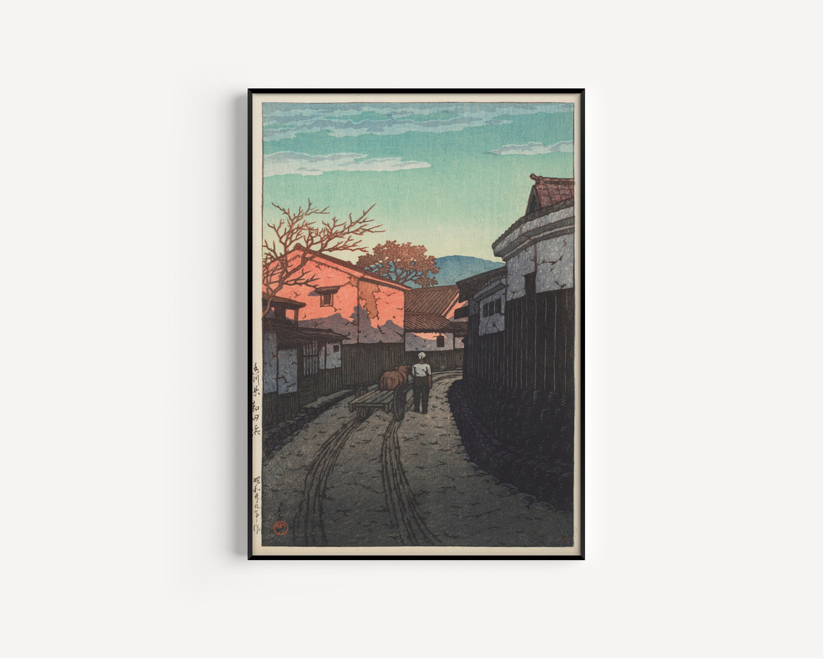Framed art print of Wadahama in Kagawa Prefecture by Kawase Hasui, in a slim black frame on a plain white wall