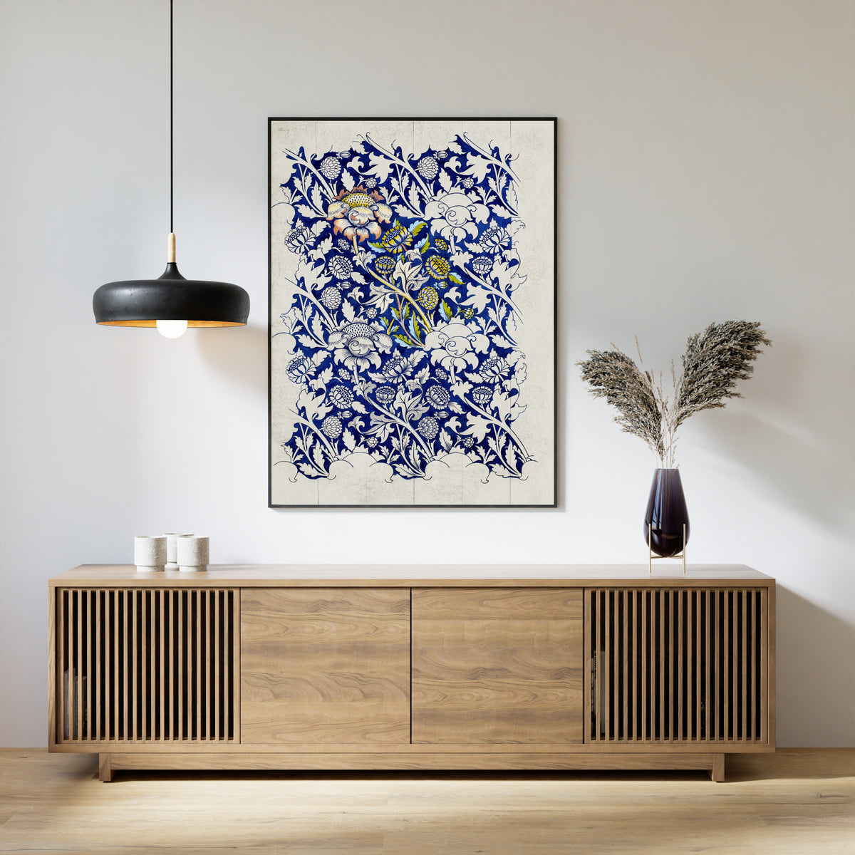 Framed art print of Wey (Design Drawing) by William Morris, above a slatted wood sideboard