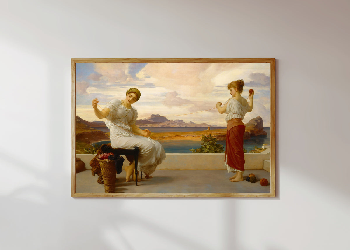 Framed art print of Winding the Skein by Frederic Leighton, in a light wood frame on a sunlit white wall