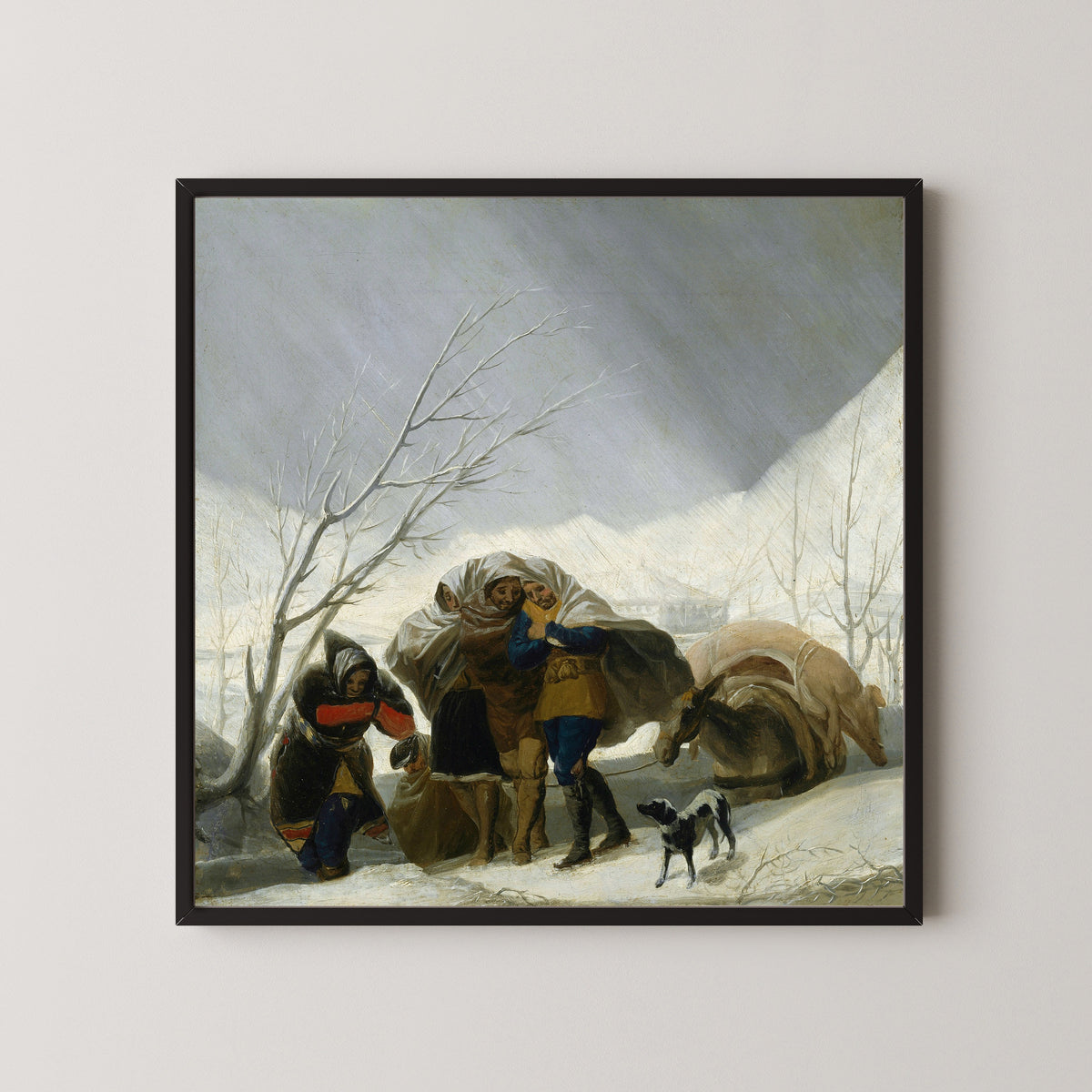 Framed art print of Winter Scene by Francisco de Goya, in a black frame on a pale wall