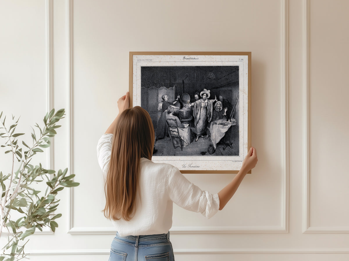 Framed art print of Witches Putting a Creature in a Boiling Cauldron by Unknown artist, hung on a panelled wall
