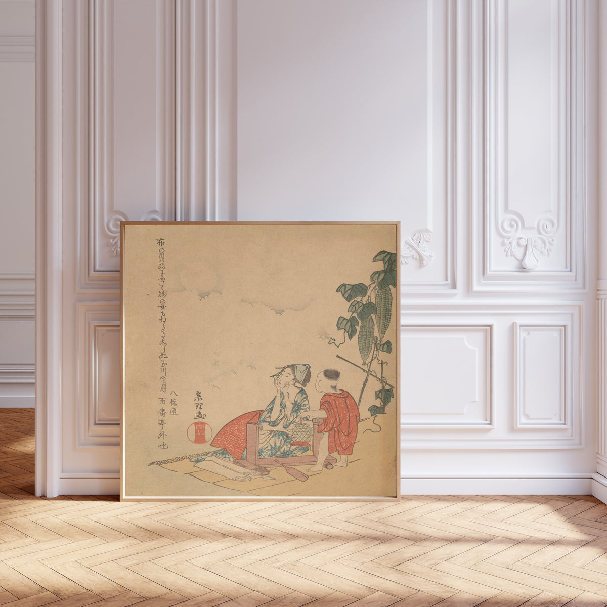 Framed art print of Woman and Boy with Melon Plant by Katsushika Hokusai, leaning against pale pink panelling on a herringbone floor
