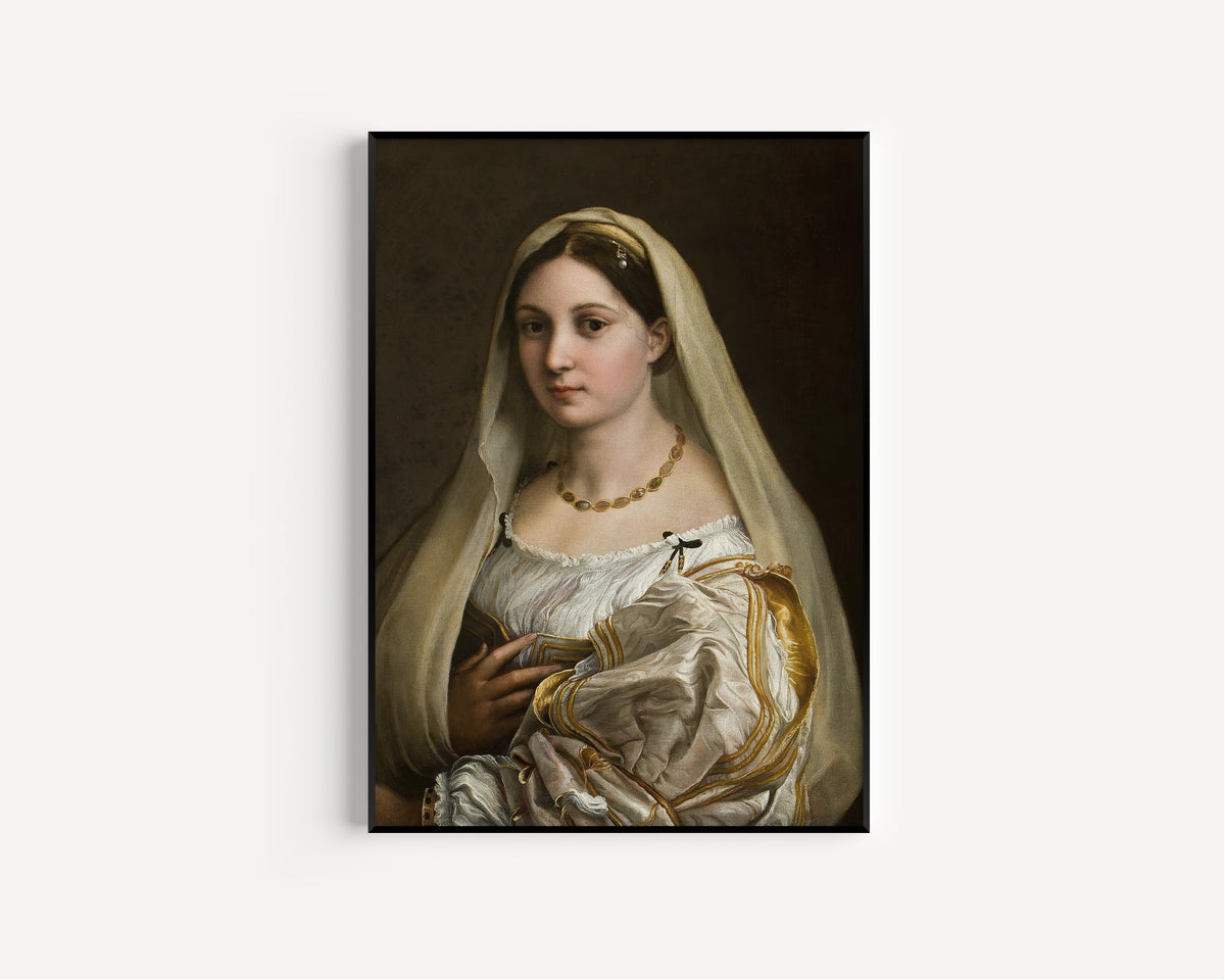 Framed art print of Woman with a Veil by Raphael, in a slim black frame on a plain white wall