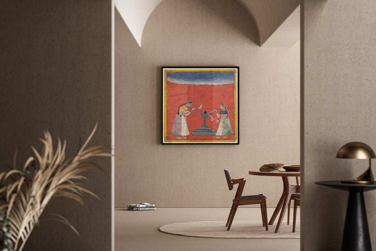 Framed art print of Women worshiping a Shiva linga: Devagandhari Ragini of Hindol Raga by Pahari school, in a sunlit dining corner