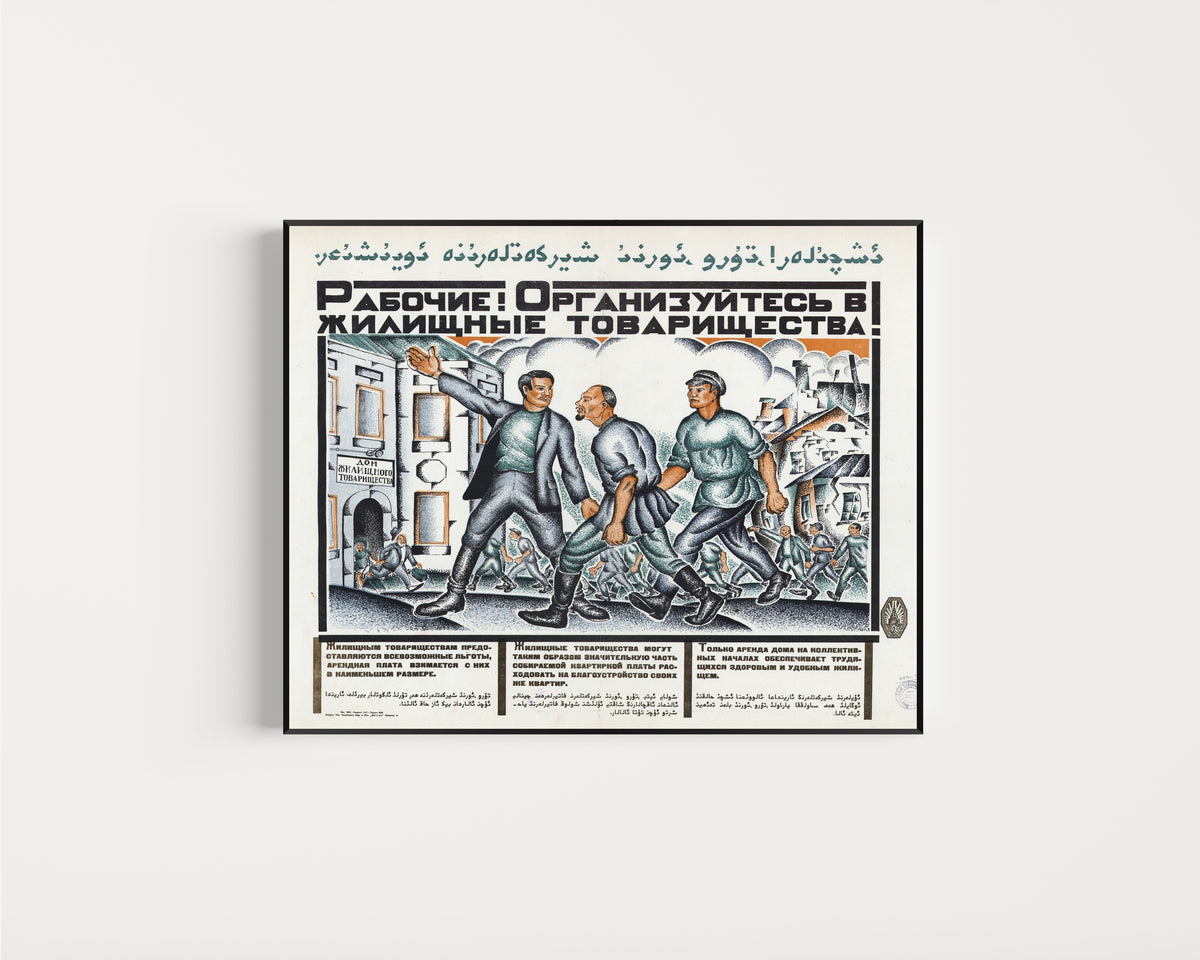 Framed art print of Workers! Organise into housing cooperatives!, in a slim black frame on a plain white wall