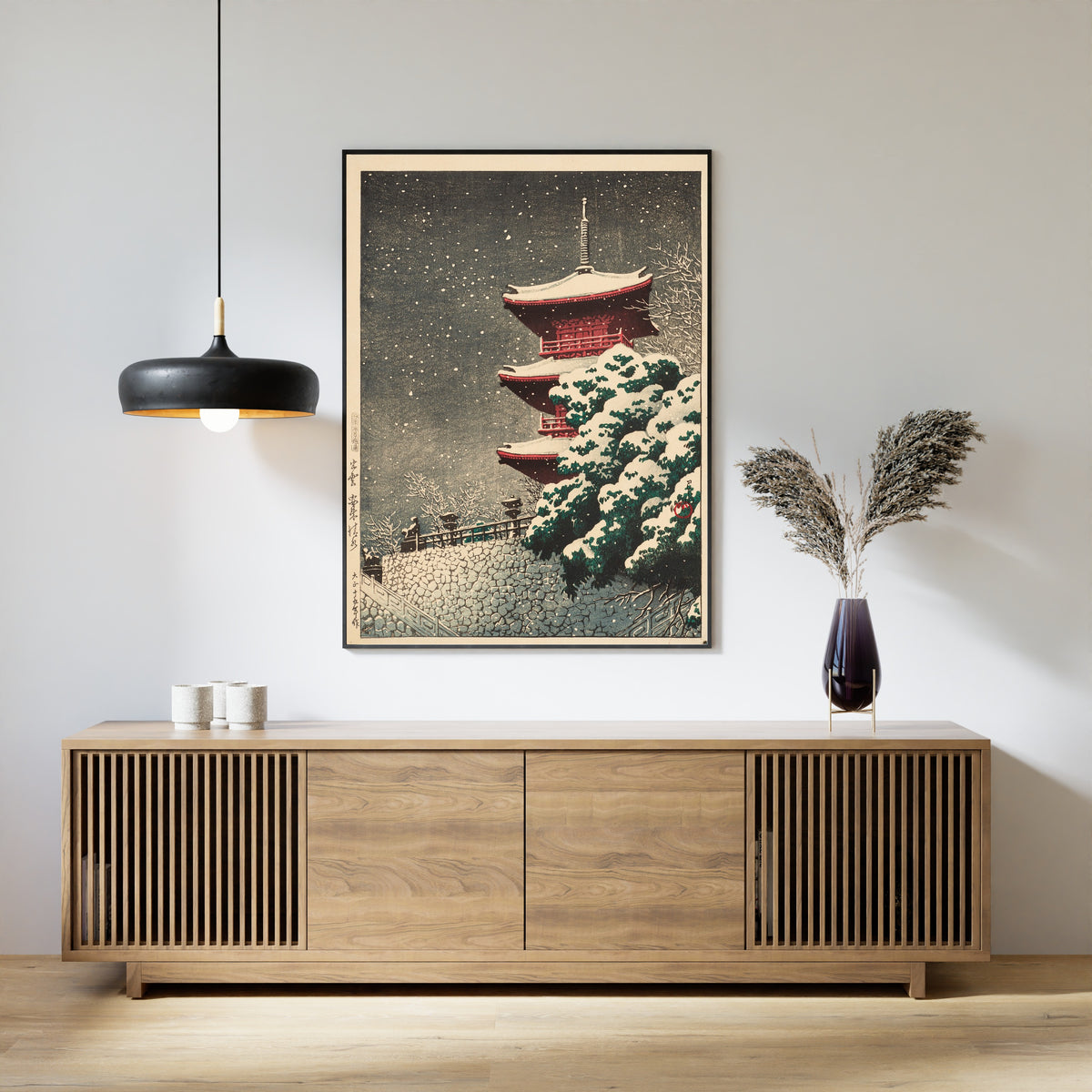 Framed art print of Yasugi Kiyomizu Temple at Izumo by Kawase Hasui, above a slatted wood sideboard