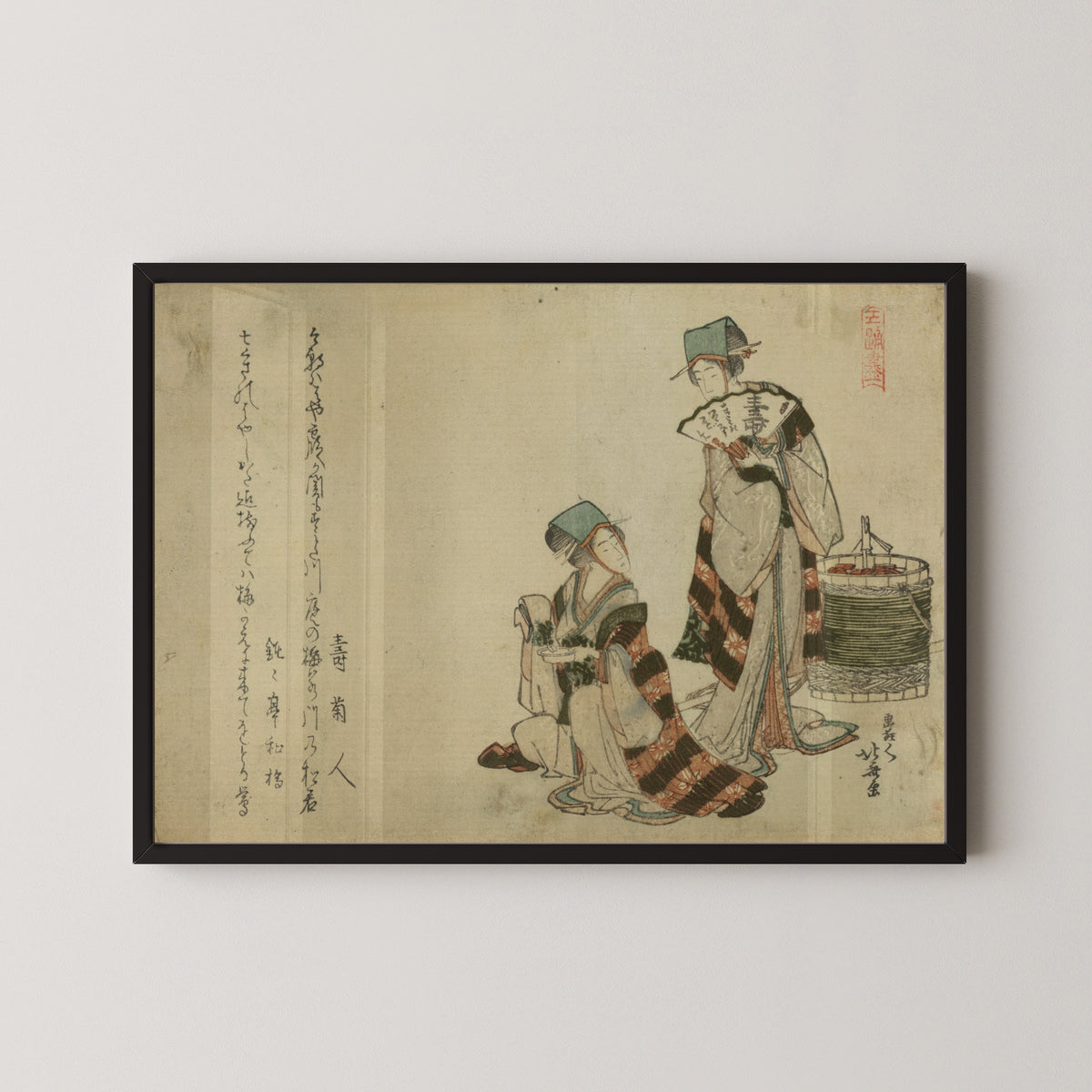 Framed art print of Yoshiwara suzume by Katsushika Hokusai, in a black frame on a pale wall