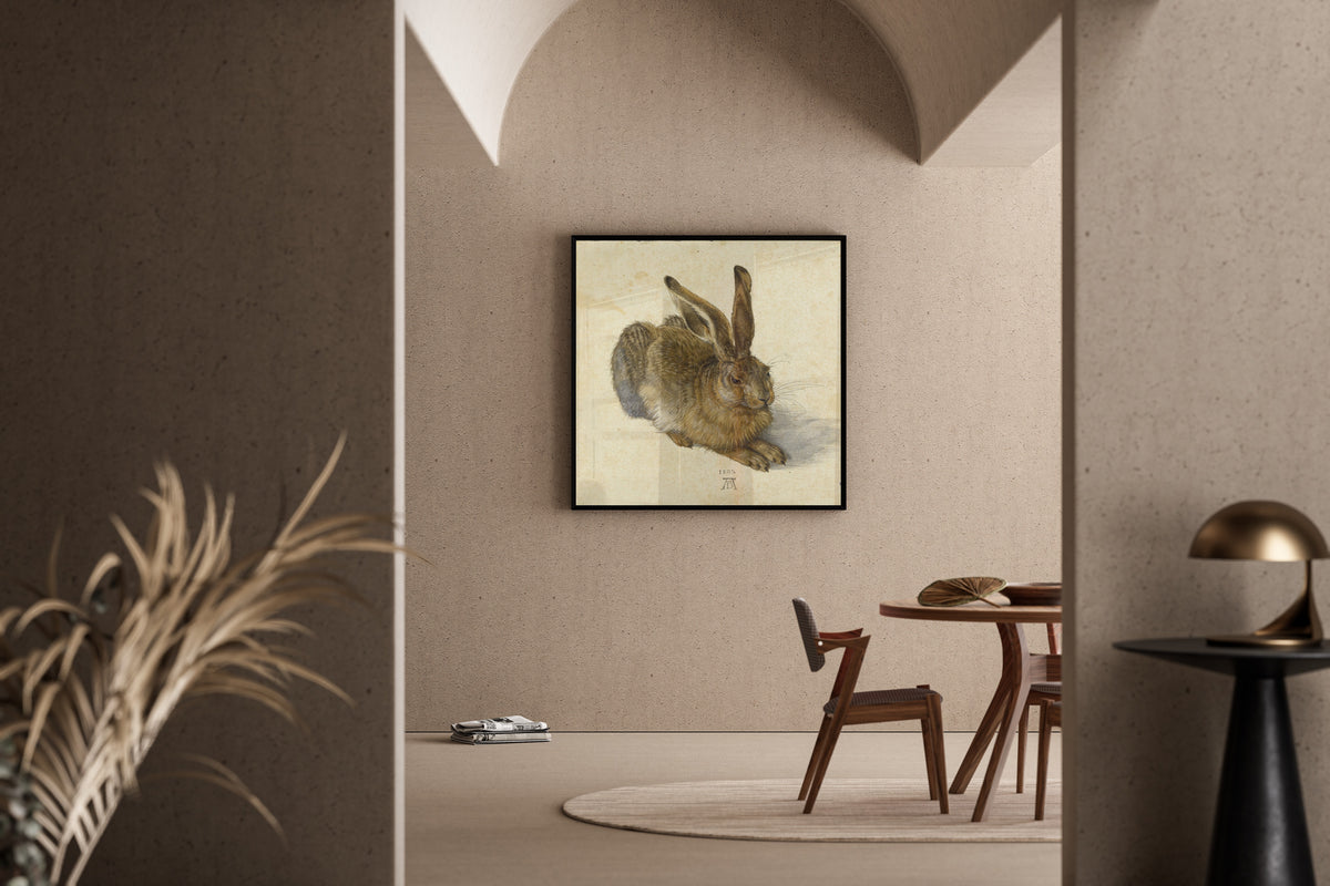 Framed art print of Young Hare by Albrecht Dürer, in a sunlit dining corner
