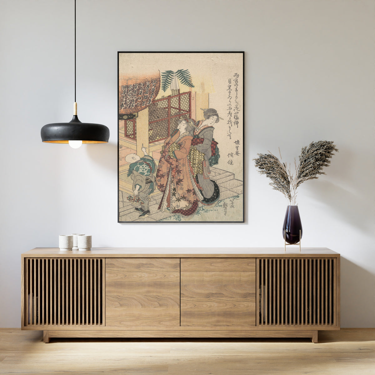 Framed art print of Young Ladies Paying Homage to a Shrine by Katsushika Hokusai, above a slatted wood sideboard