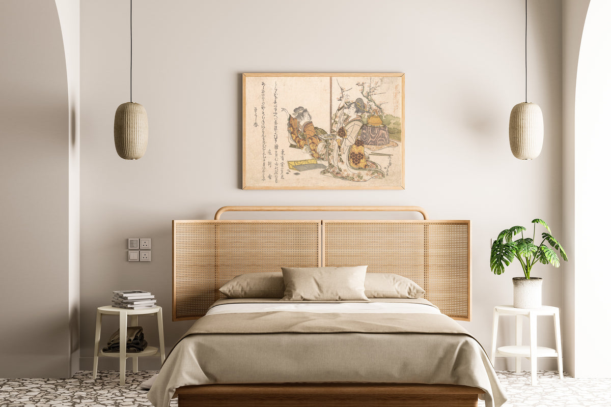 Framed art print of Young Woman and Little Girl Playing Musashi by Katsushika Hokusai, above a cane-headboard bed