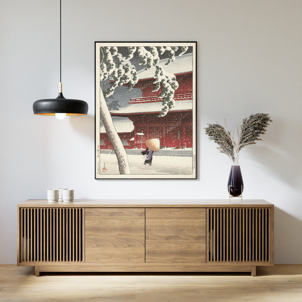 Framed art print of Zojoji Temple, Shiba by Kawase Hasui, above a slatted wood sideboard