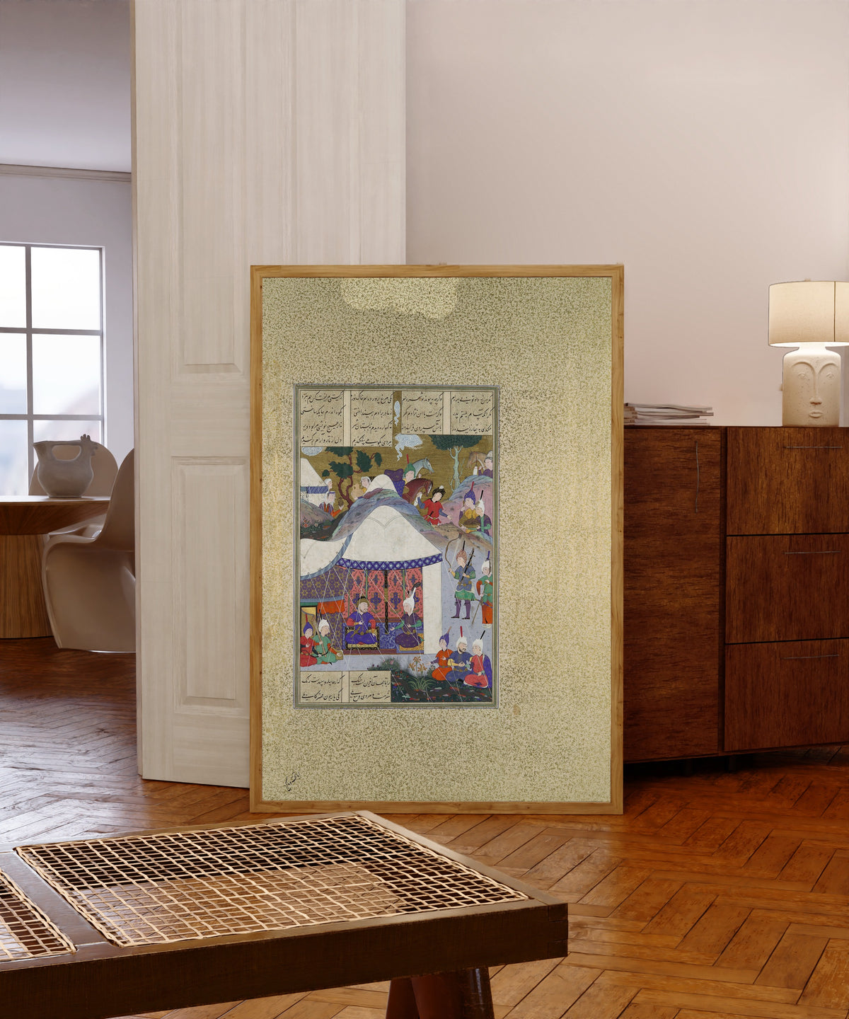 Framed art print of Shahnama of Shah Tahmasp: Zal Questions… by Abd al-Aziz (attributed), in a light wood frame leaning in a warm room with a parquet floor