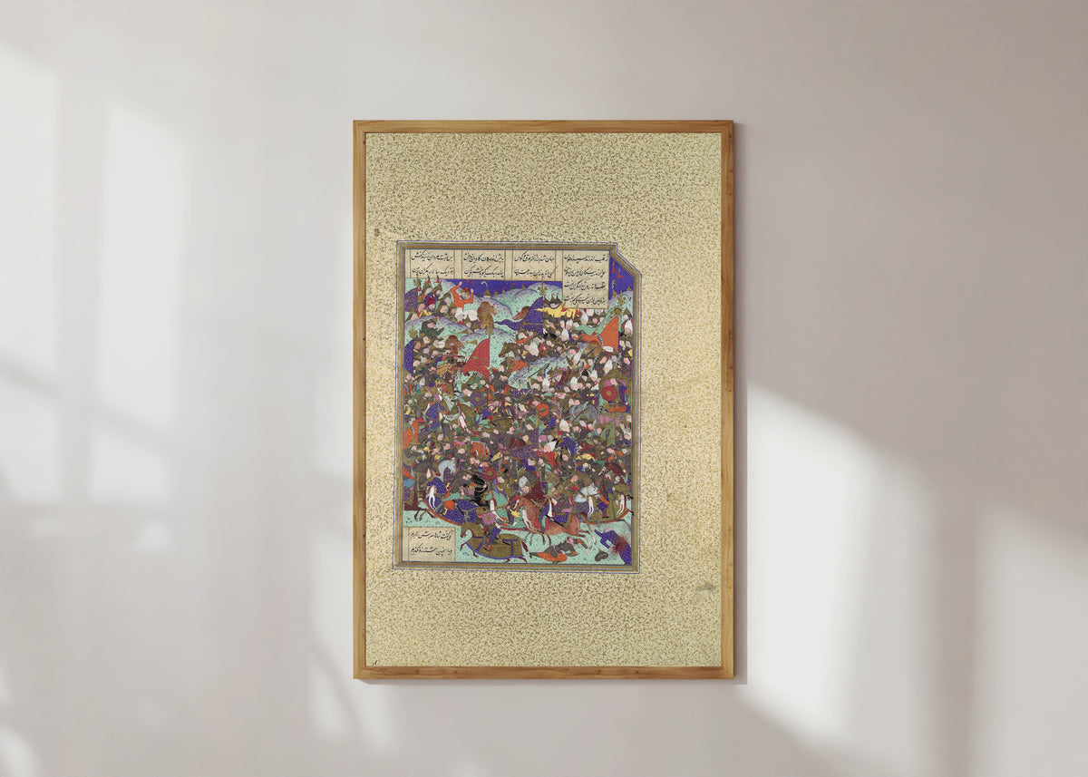 Framed art print of Shahnama of Shah Tahmasp: Kai Khusrau Defeats the Army of Makran by Abd al-Vahhab (attributed), in a light wood frame on a sunlit white wall