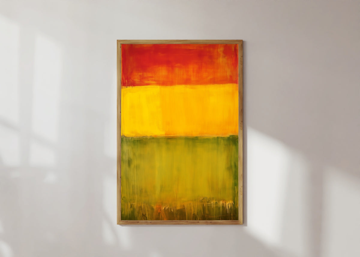 Framed art print of Green, Yellow and Red (Colour Field) by After Mark Rothko, in a light wood frame on a sunlit white wall