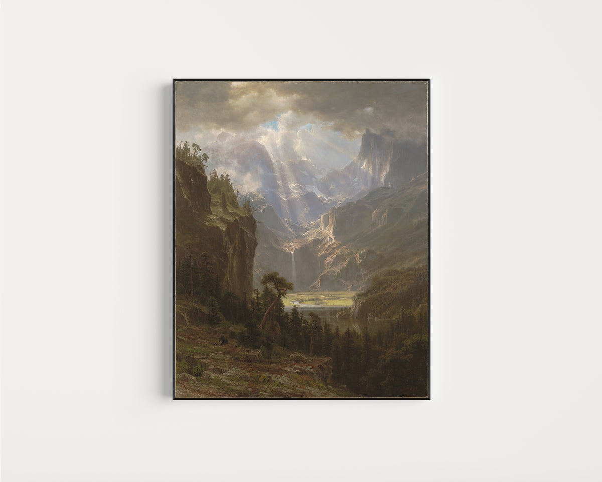 Framed art print of The Rocky Mountains, Lander's Peak (Alternate Version) by Albert Bierstadt, in a slim black frame on a plain white wall