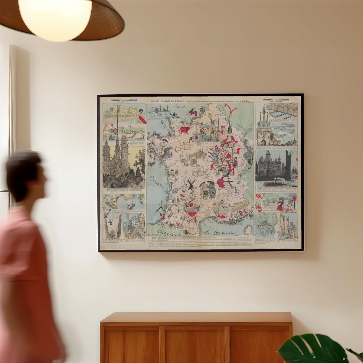 Framed art print of New Map of France, After the Latest Discoveries of the Scientists… by Albert Robida, in a slim black frame on a warm wall in a sunlit room