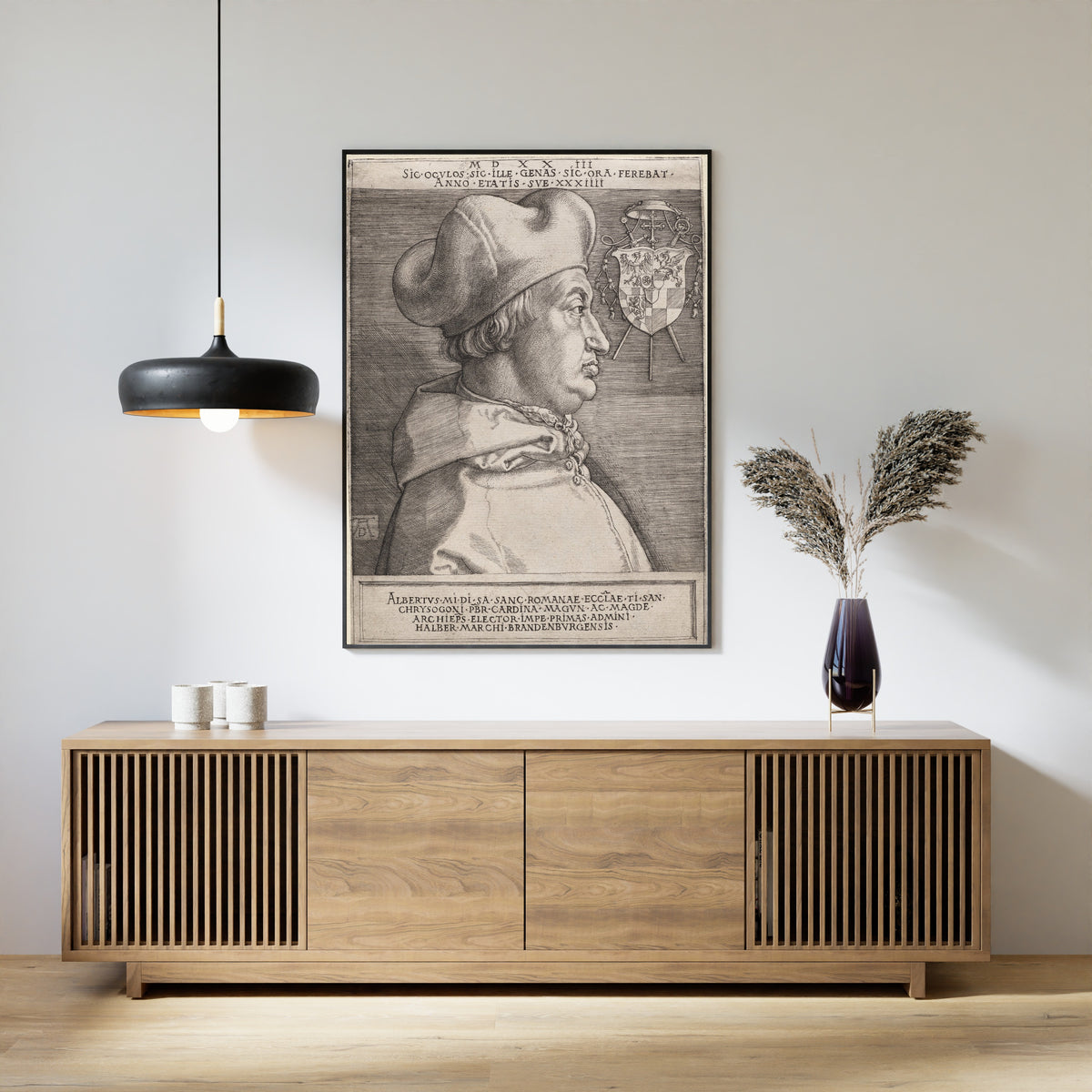 Framed art print of Cardinal Albrecht of Brandenburg (The Large Plate) by Albrecht Dürer, above a slatted wood sideboard