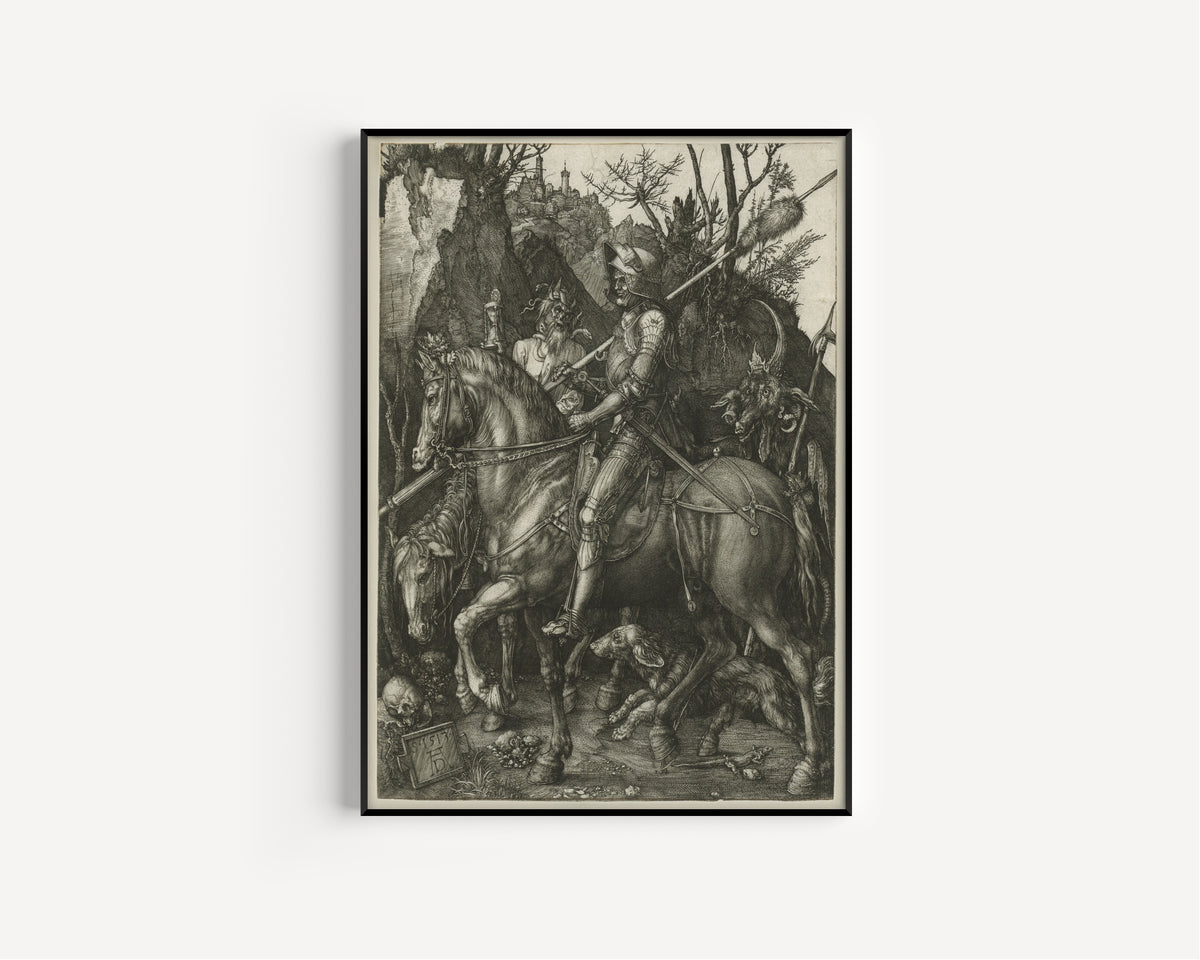 Framed art print of Knight, Death, and the Devil by Albrecht Dürer, in a slim black frame on a plain white wall