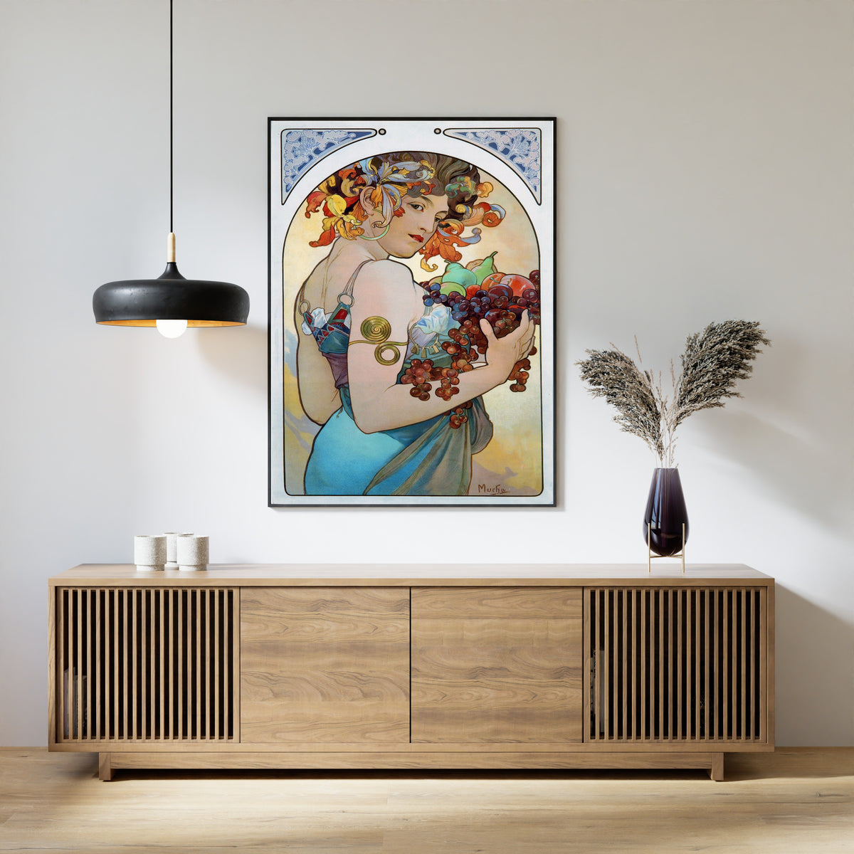 Framed art print of Fruit by Alphonse Mucha, above a slatted wood sideboard